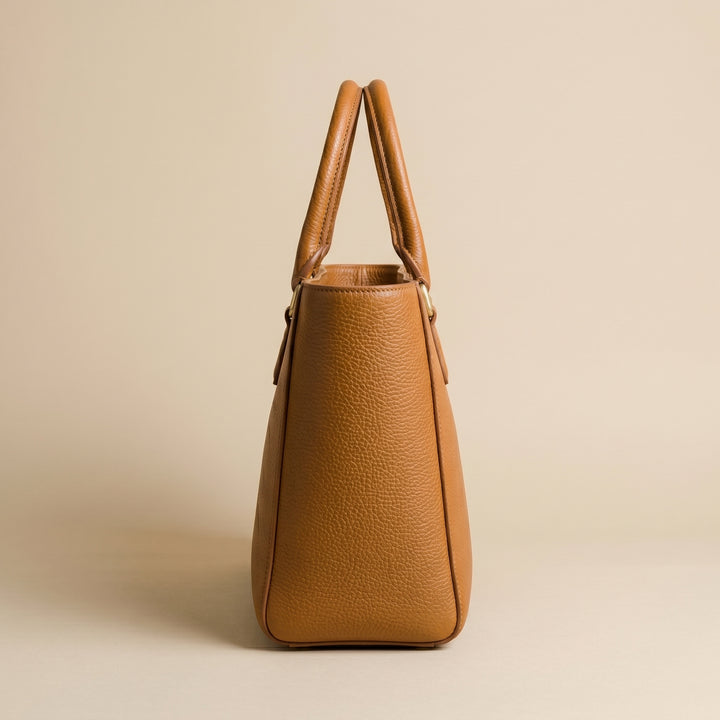 Brown leather handbag side